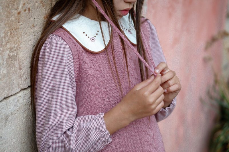 Chaleco punto rosa viejo